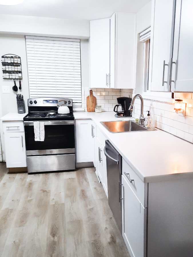 Minimalist white kitchen with white kitchen counters