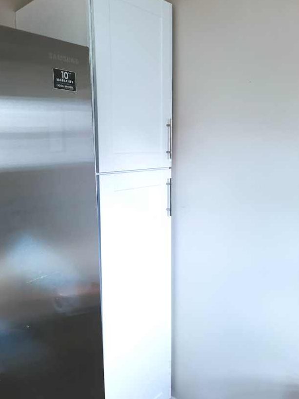 Narrow deep corner kitchen pantry
