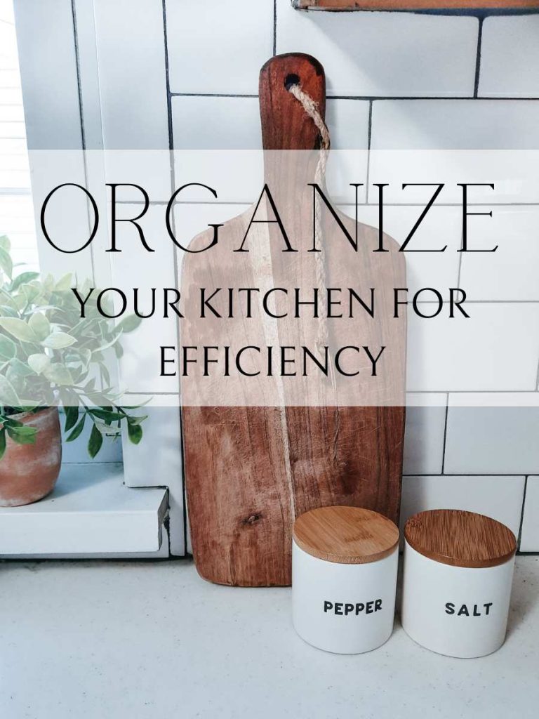Organized wooden cutting board on white counter with salt and pepper containers