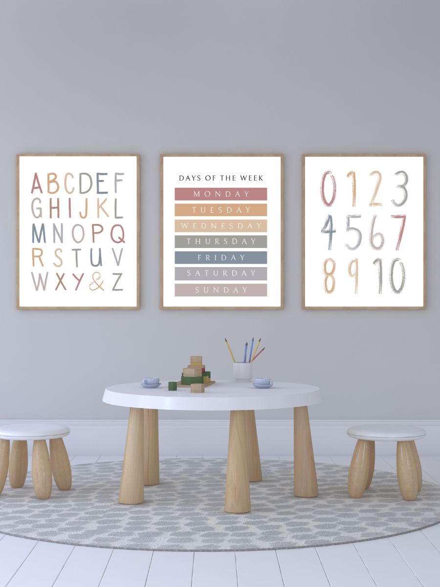 Neutral nursery playroom with pastel colorful educational letters numbers and days of the week framed posters